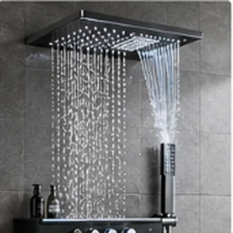 Matte black multi-function shower panel with a rain section, a waterfall spout and a shelf with control knobs