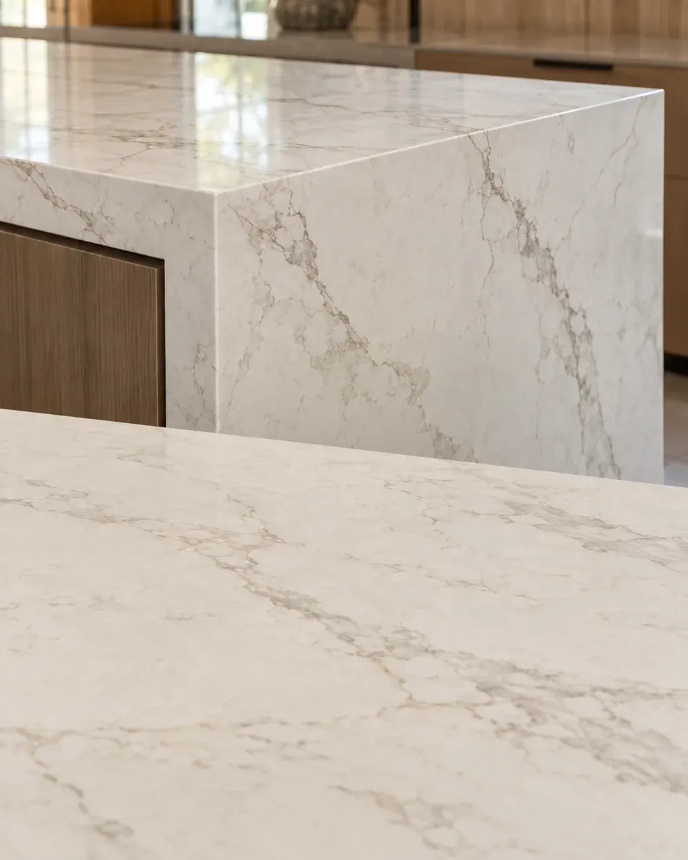 Mitered and waterfall countertop edge in Los Angeles, CA: quartz corner with matching veining