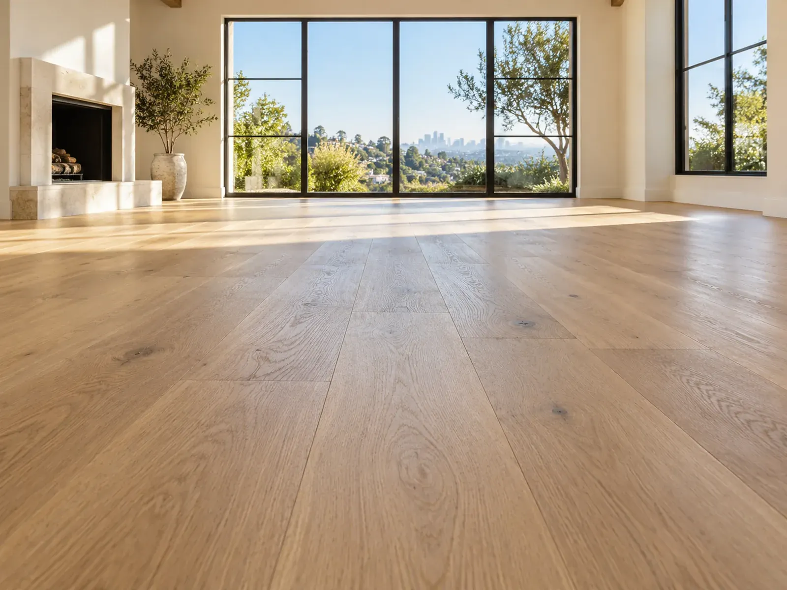 Flooring installation in Los Angeles: wide-plank oak hardwood floor in a sunlit living room